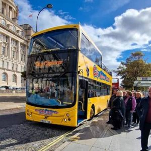 The Beatles City Explorer bus parked at the Pier Head.